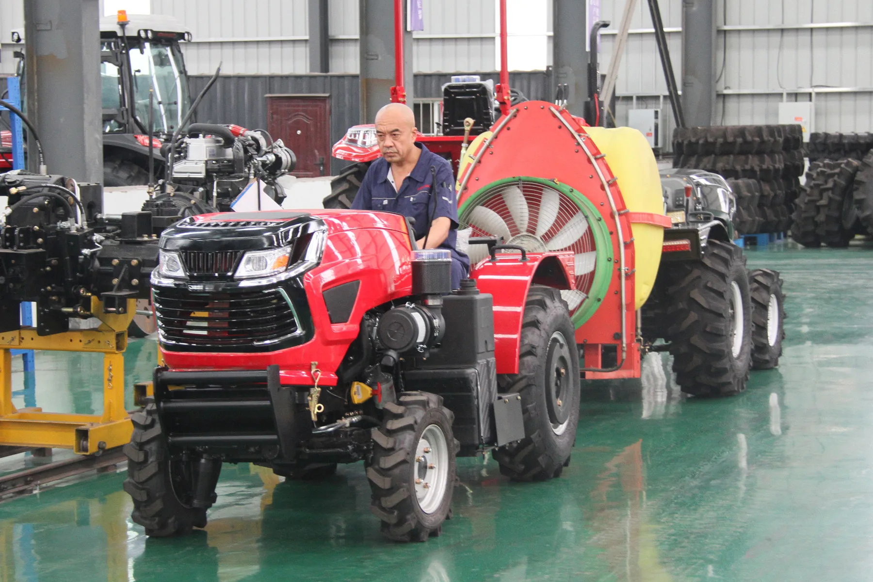 HETIAN technician inspecting tractor